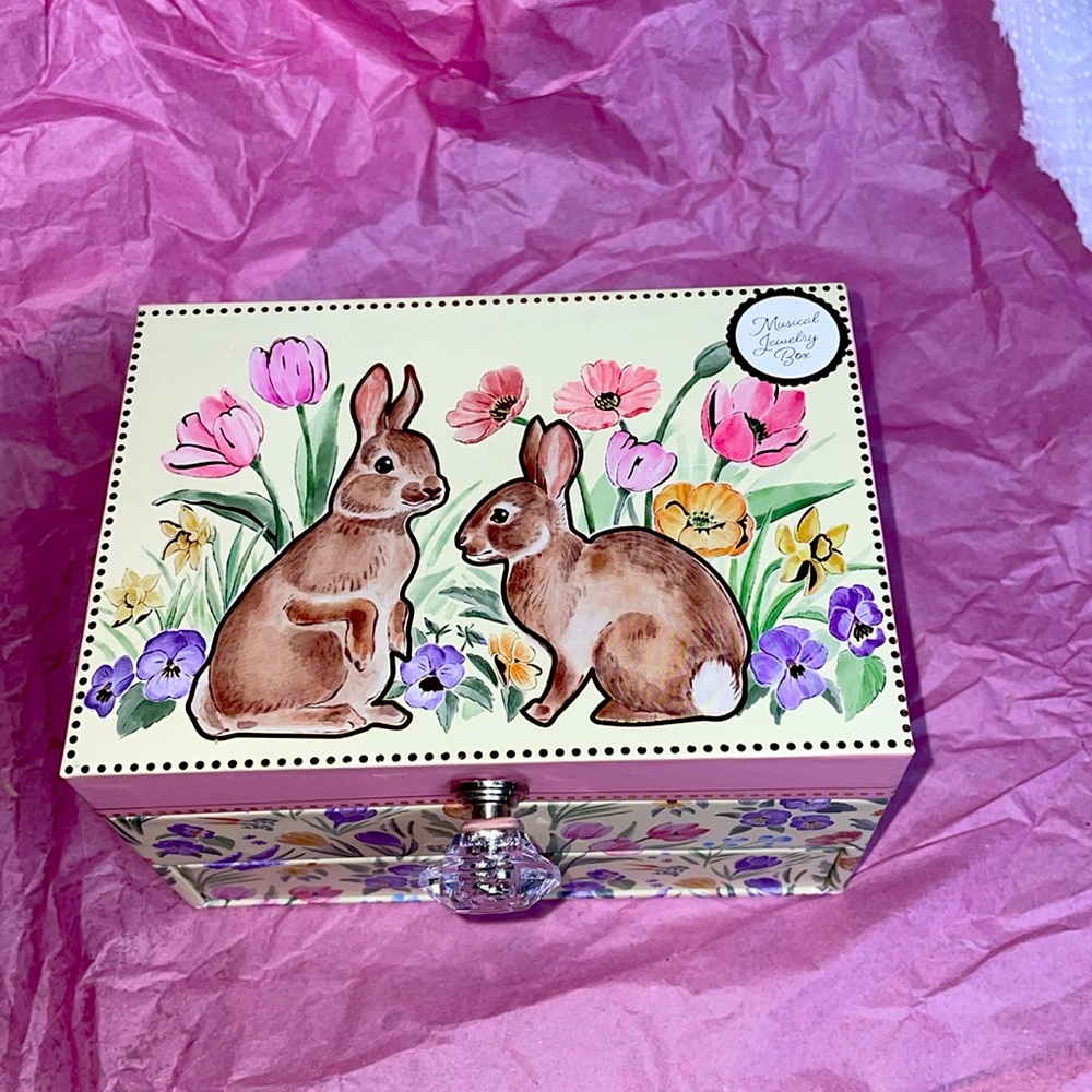 Adorable, musical jewelry box with little bunnies and flowers and carrots